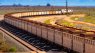 An image of a freight train carrying iron-ore