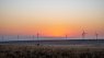 Image of wind turbines at sunset