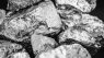 A black and white image of a metal ore