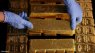 Gold Set for weekly gain as investors weigh rates, trade impact