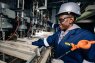 Agnes Modiga inside Mintek's rare earth elements pilot plant.