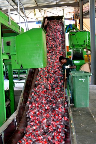 RECYCLING PUSH PET bottles making their way into the material recovery facility at Rent-A-Drum