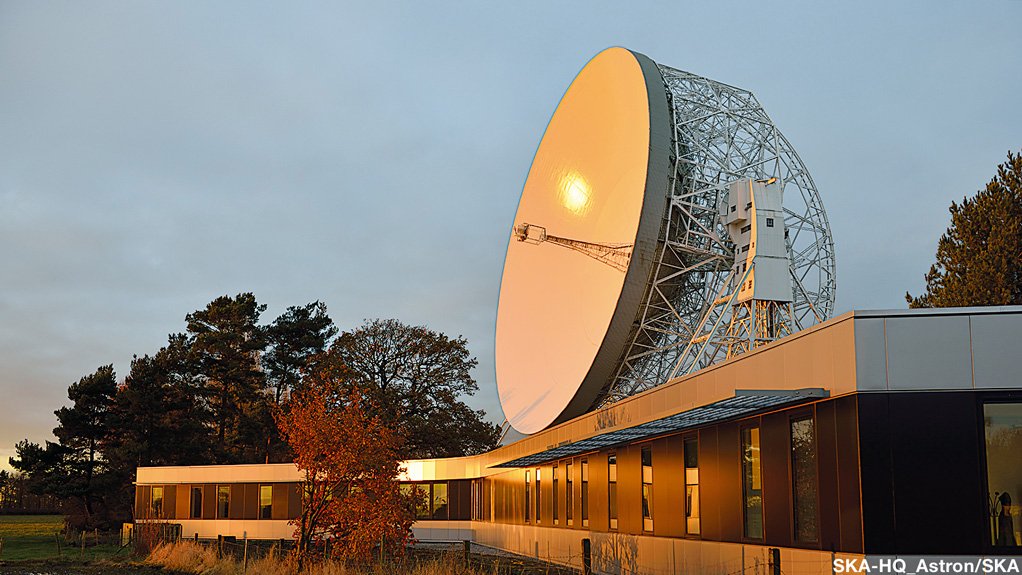 The new SKA head office, with the Lovell radio telescope in the background