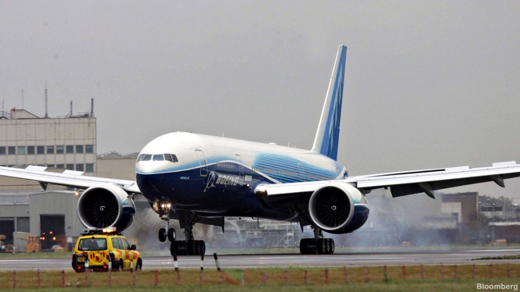 A Boeing 777-200LR aircraft landing at London Heathrow Airport