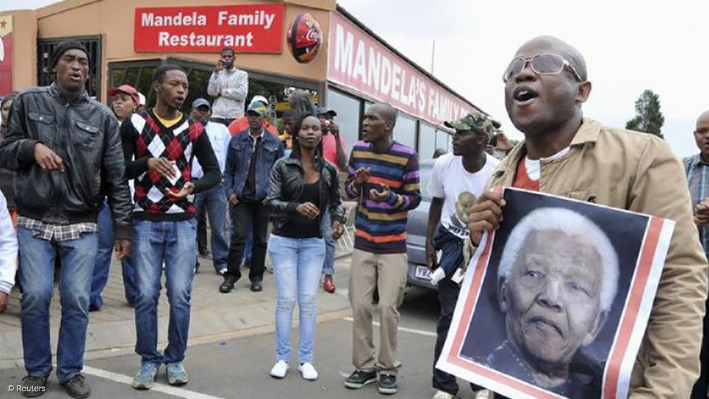 Mandela served people with distinction - Mabuza