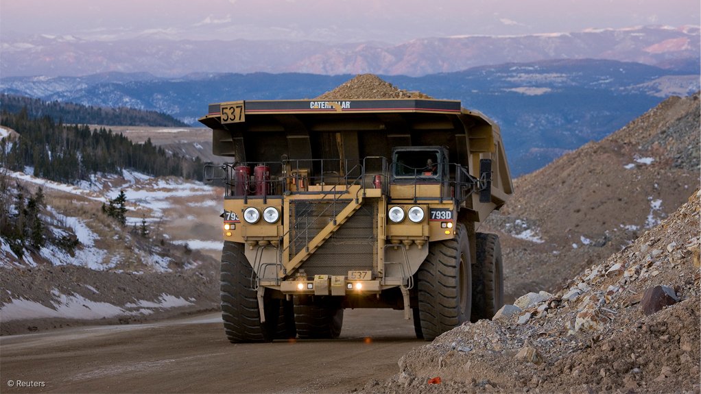 Caterpillar reports record 2013 cash flow despite $10bn revenue drop