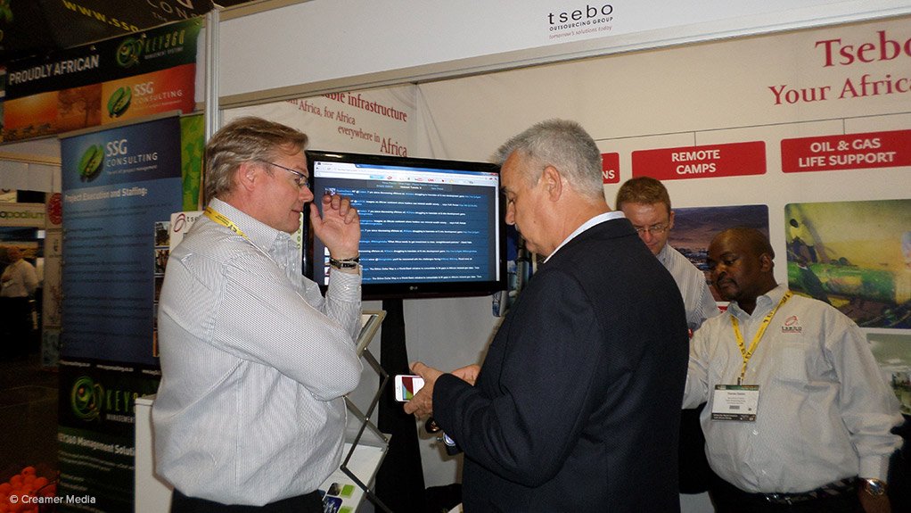 TSEBO ON DISPLAY Denis Hourquebie and Clive Smith discuss tactics during the Mining Indaba 