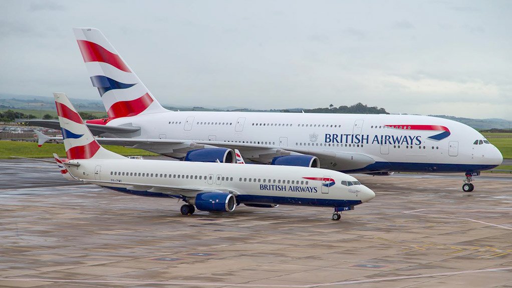 NEXT LEVEL OF EFFICIENCY A Comair Boeing 737-800 stands in front of a BA Airbus A380 