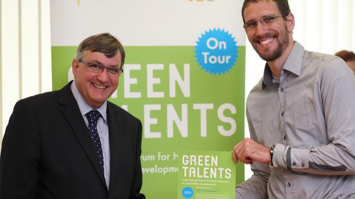 LOCAL IS LEKKER
The German Federal Ministry of Education and Research’s Wilfried Kraus (left) congratulates Green Talents 2013 winner Heinrich Badenhorst
