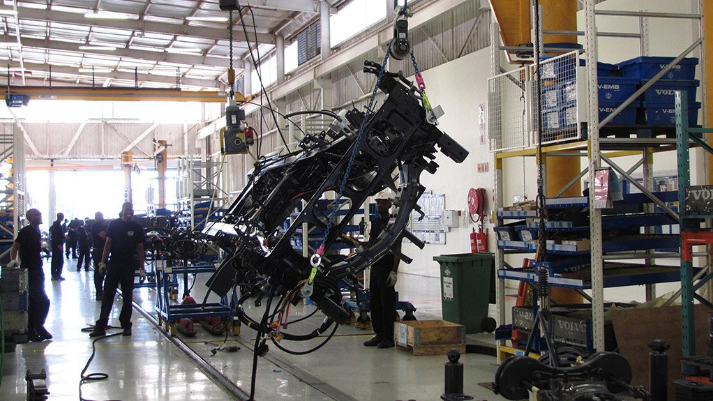 The Volvo truck plant in Durban, turning the chassis prior to cab marriage