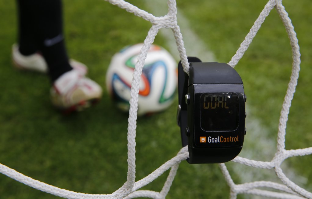 GOAL: A watch displaying the word ‘goal’ as a football rolls fully behind the goal line during a demonstration ahead of the 2014 FIFA World Cup, which kicked off in Brazil last week. GoalControl, of Germany, has been appointed as the official provider of goal-line technology for the tournament. The solution uses 14 high-speed cameras that continuously captured the coordinates of the ball. The information is linked to a computer processing system, which filters out players, the referee and any other objects. The watch, which will be worn by referees, will display the word ‘goal’ and vibrate should the ball fully cross the goal line. 