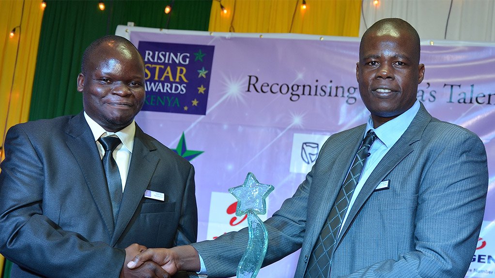 Powell Maimba, MD Engen Kenya hands out the Rising Star Award to Austin Adoyo