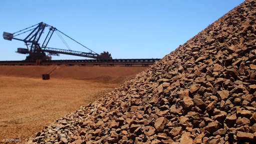 Iron-ore price slide to continue to 2017 – Wood Mackenzie