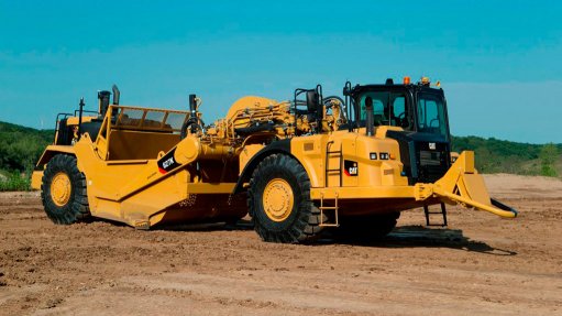 HEAVYWEIGHT
Wheel tractor-scrapers have been updated over the years to meet the changing requirements of earthmoving projects