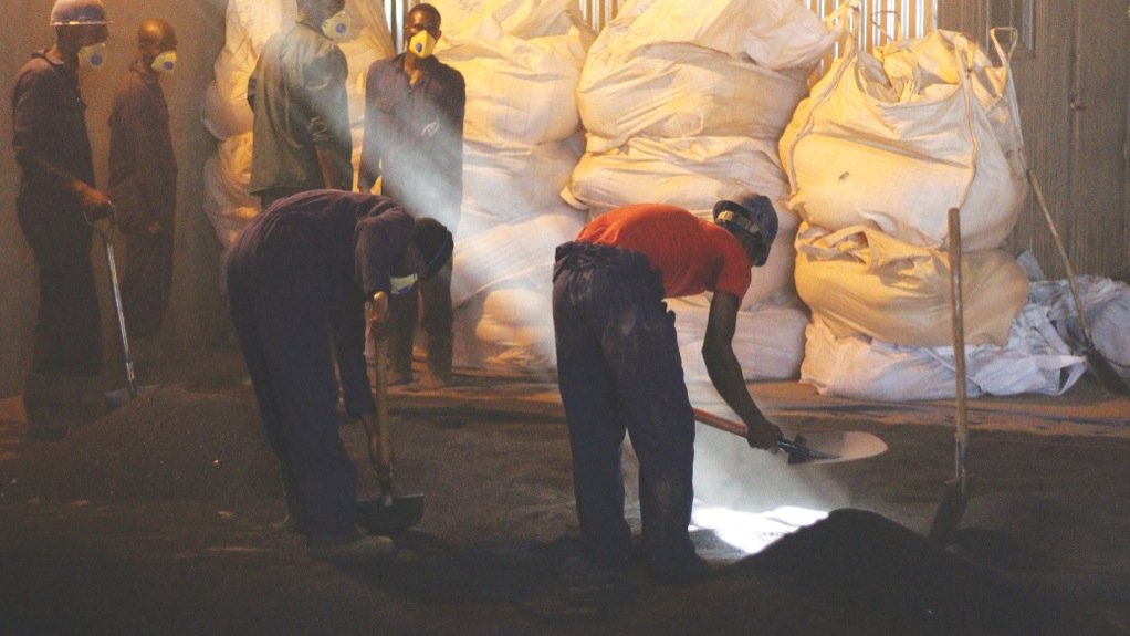 TARGET MINERAL Workers prepare coltan at a depot in the Democratic Republic of Congo 