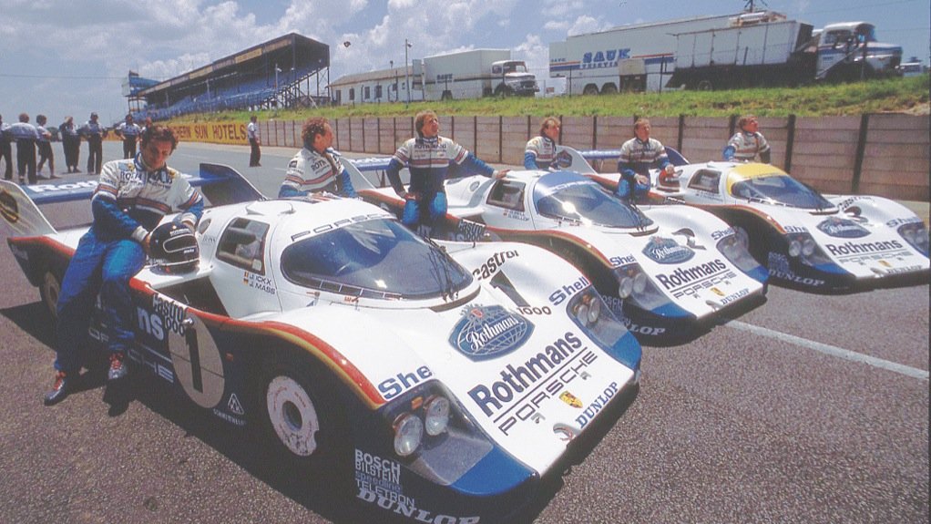PORSCHE HISTORY A line-up of three Rothmans Porsche 956s before the start of the 1983 Castrol 1 000 km race, the last round of the World Endurance Championship. The drivers in the photo are Jacky Ickx, Jochen Mass, Stefan Bellof, Derek Bell, Al Holbert and Vern Schuppan. Bell and Bellof in Car No 2 won the race from the Martini Racing Lancia LC2–83 of Ricardo Patrese and Alessandro Nannini, with the Porsche 956 (Car No 1) of Ickx and Mass third 