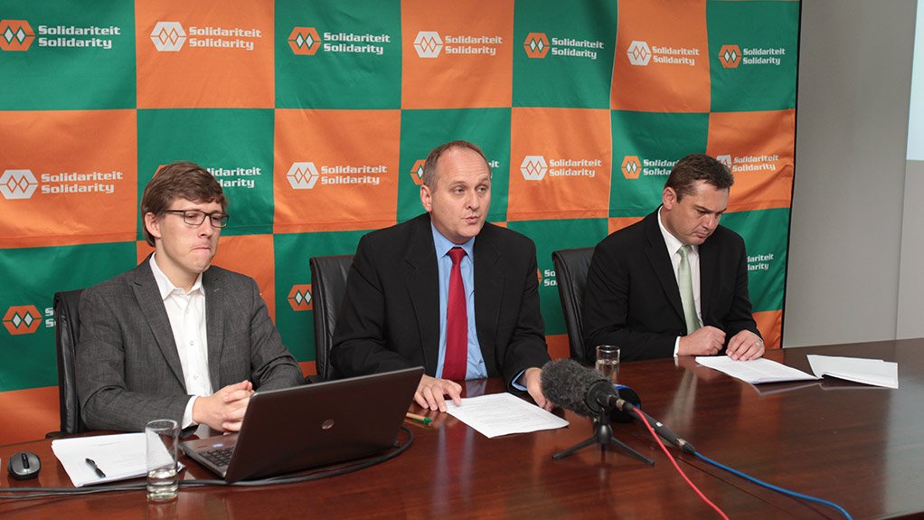 Piet le Roux, Dirk Hermann and Johan Kruger at the union's electricity crisis briefing