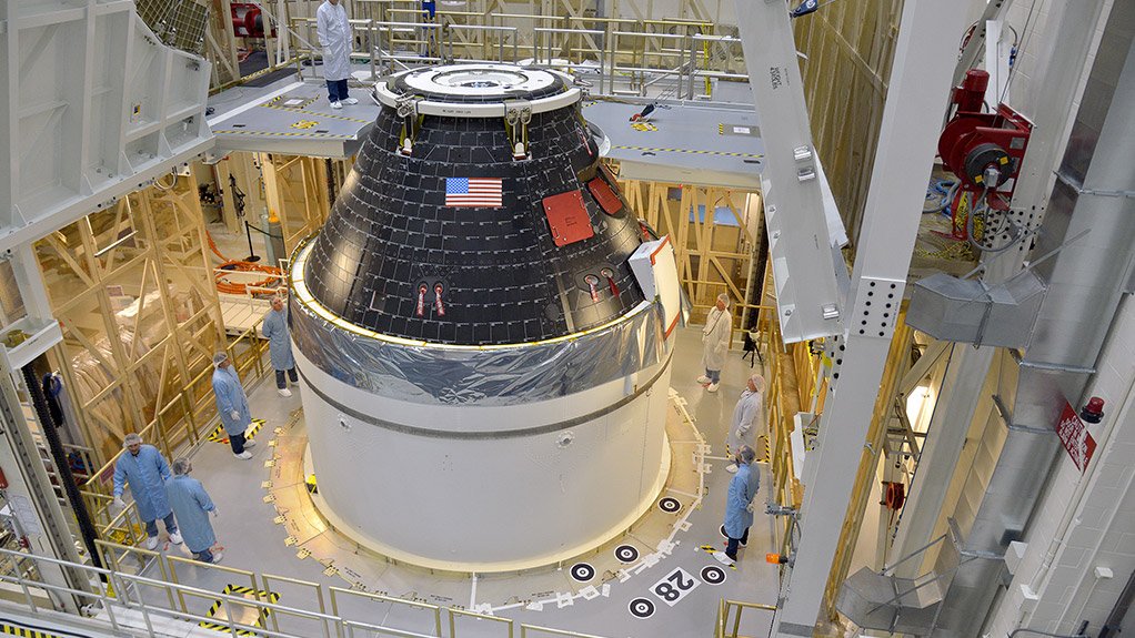 The conical Orion capsule, attached to its service module, but before integration with its Delta IV launch rocket 