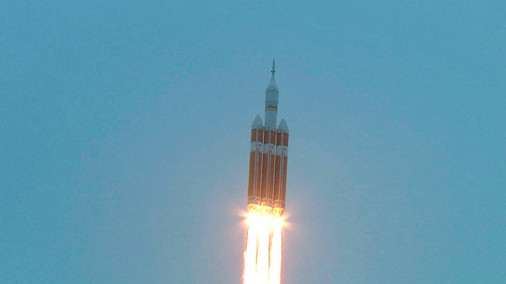 The Delta IV rocket carrying the Orion lifts off