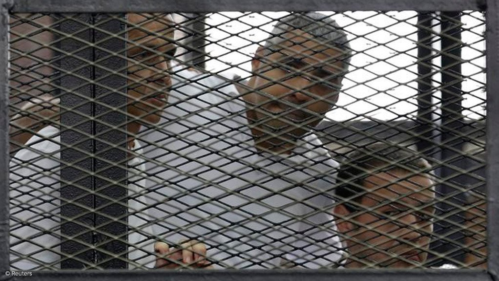 Peter Greste, Mohamed Fahmy and Baher Mohamed awaiting trial