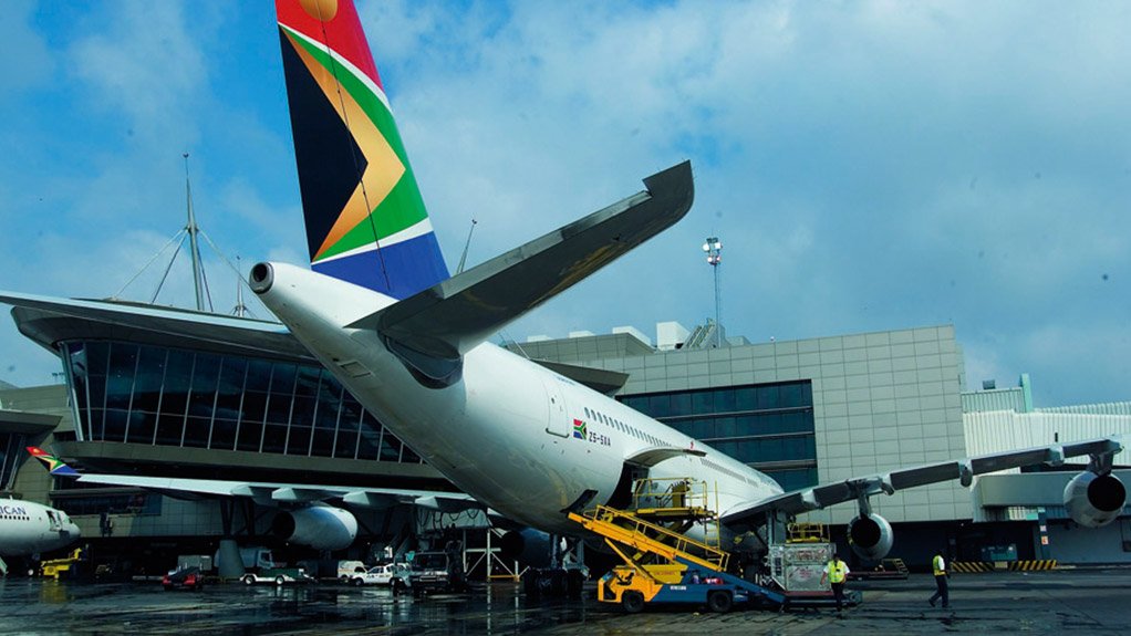 An Airbus A340-600 of SAA loads cargo at OR Tambo International Airport