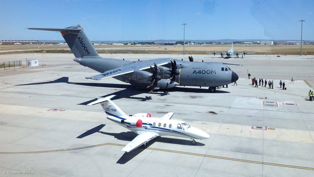 An Airbus A400M (with a Cessna Citation business jet in the foreground)