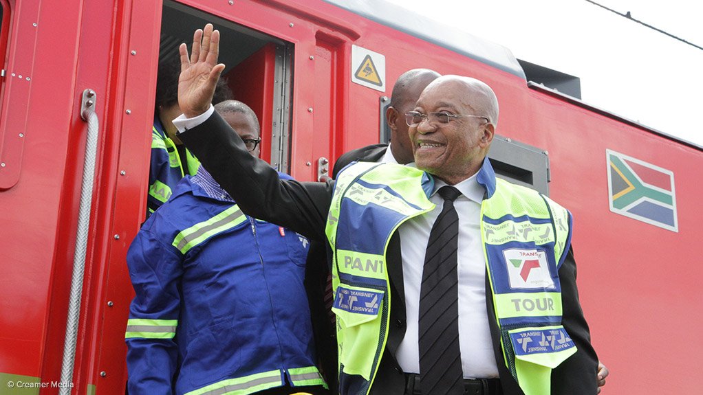 President Zuma disembarks from one of the 85 electric locomotives assembled near Pretoria