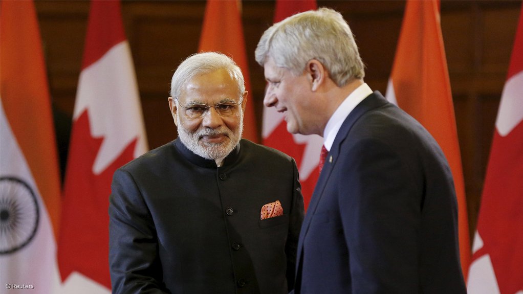 India's Prime Minister Narendra Modi and Canada's Prime Minister Stephen Harper shake hands in Ottawa.