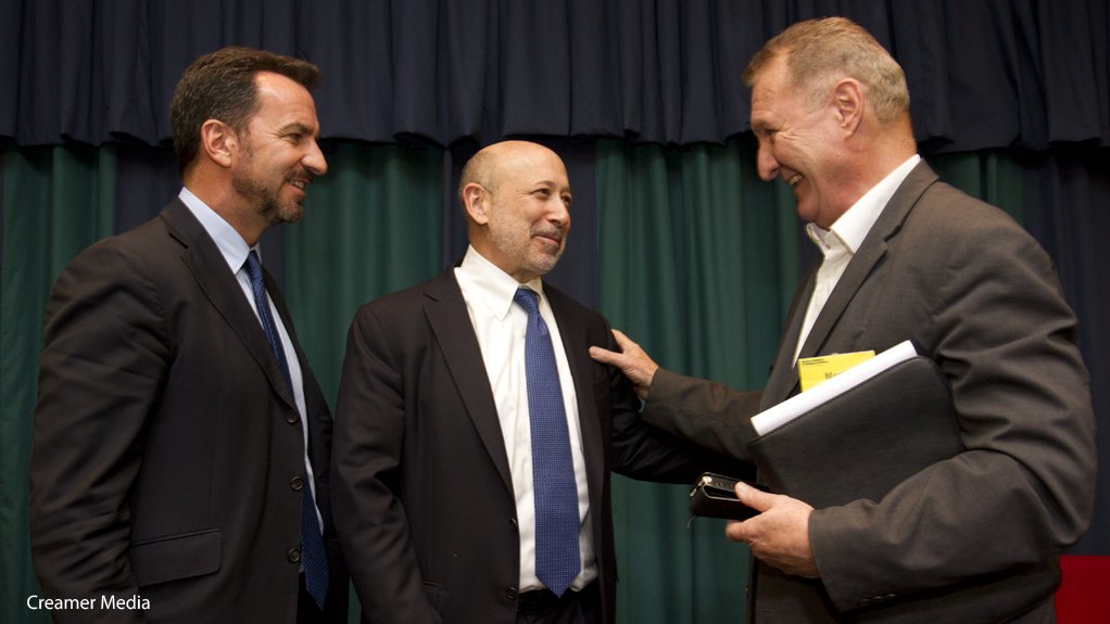 Lloyd Blankfein (centre) flanked by Colin Coleman (left) and Martin Creamer