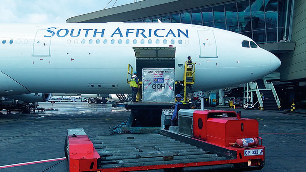CARGO HOLD Most airlines, including SAA, carry most air cargo in the holds under the passenger decks of their airliners. A cargo container is loaded onto an Airbus A330