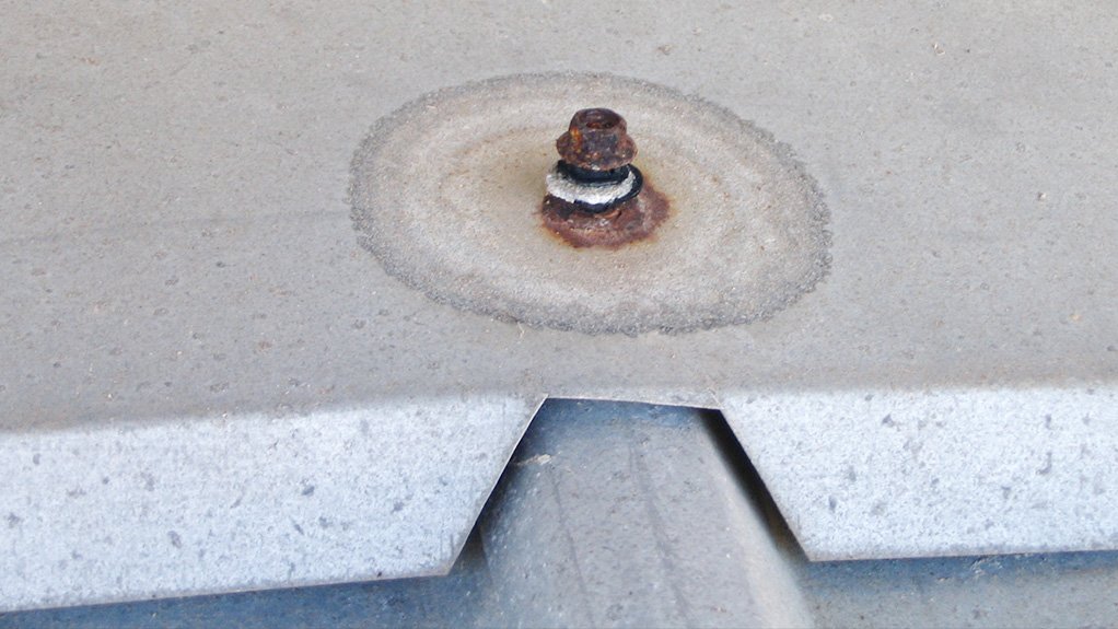 CORRODED FASTENER Fasteners and washers with inferior protective coatings may initially save money, but will ultimately create more maintenance costs 
