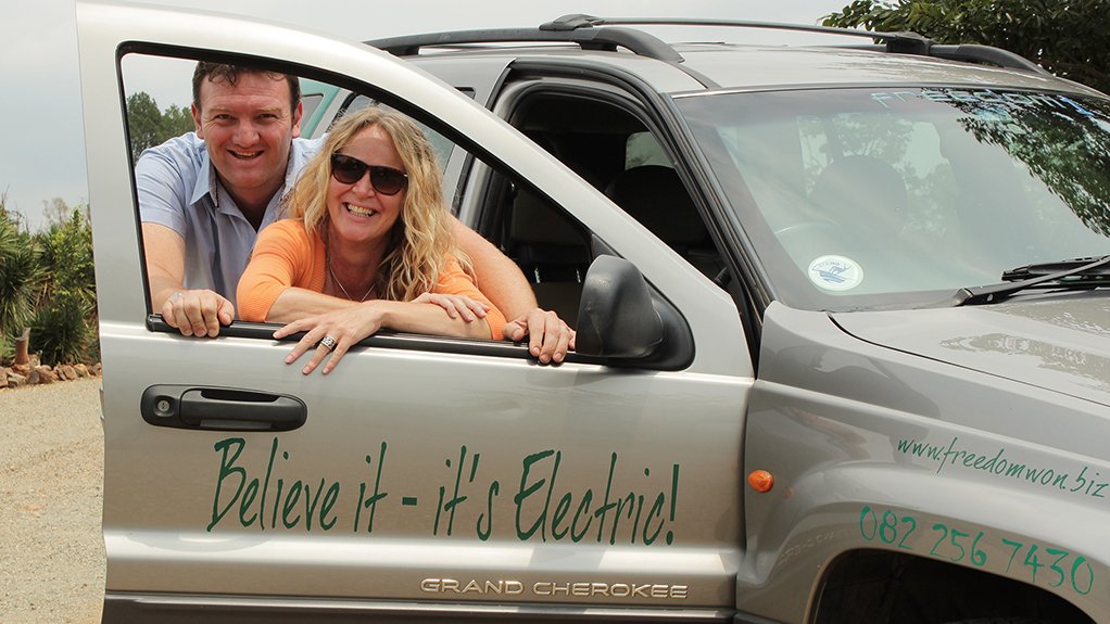 ELECTRIC CONVERTED CAR
Freedom Won co-founders Antony English and Lizette Kriel stand next to the company’s first converted electric vehicle