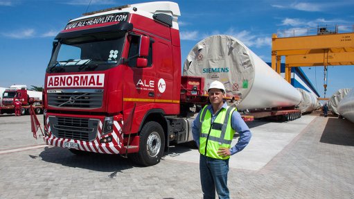 Locally made wind-turbine tower sections set off from Atlantis factory
