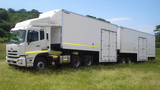 PIONEER DESIGN
The fibre-glass construction of the ‘step-decked’ trailers provides for good waterproofing, while the double doors on the sides ensure easy access
