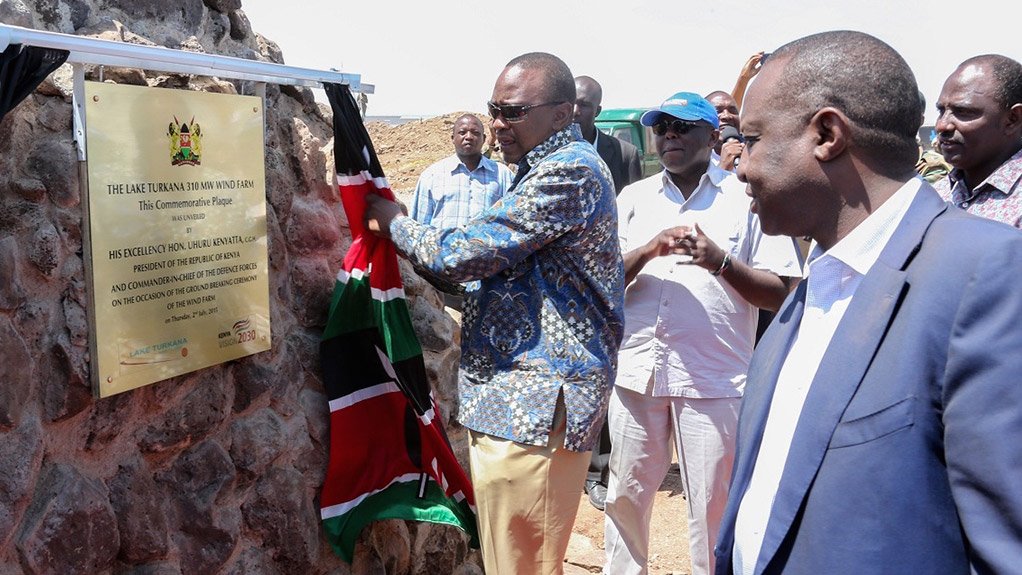 UHURU KENYATTA
Kenya's president unveils a commemorative plaque at Lake Turkana Wind Power groundbreaking ceremony
