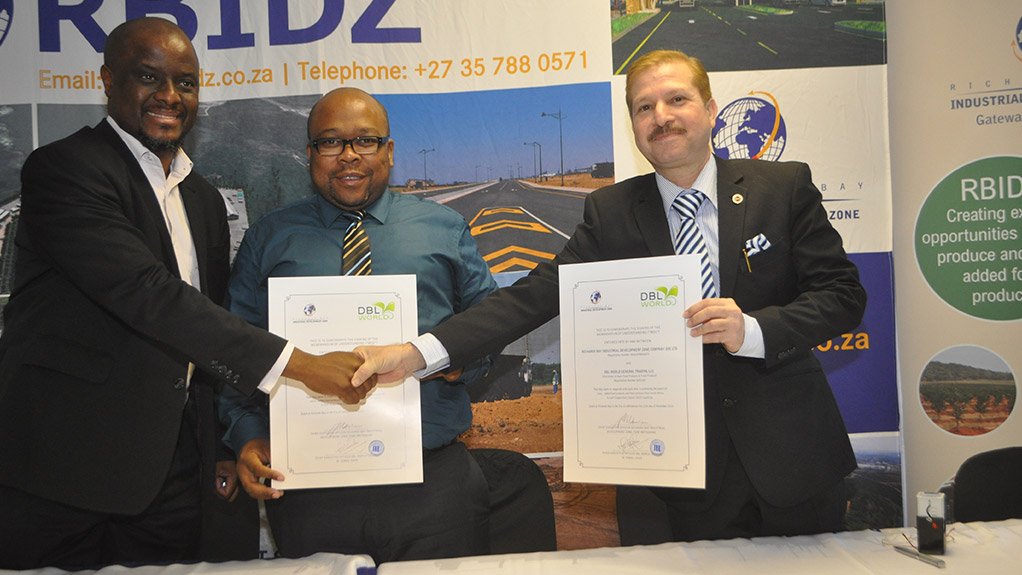 SIGNING CEREMONY RBIDZ CEO Pumi Motsoahane and DBL CEO Ismail Khan shake hands after signing a MoA for the delivery of agroprocessed goods to Dubai
