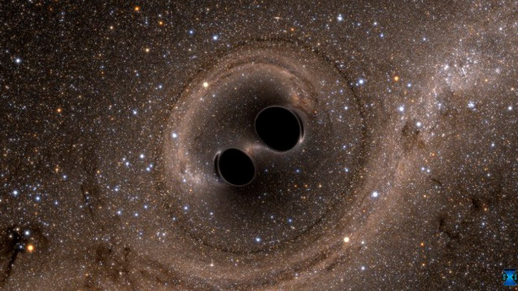 An artist’s impression of two black holes that are about to merge