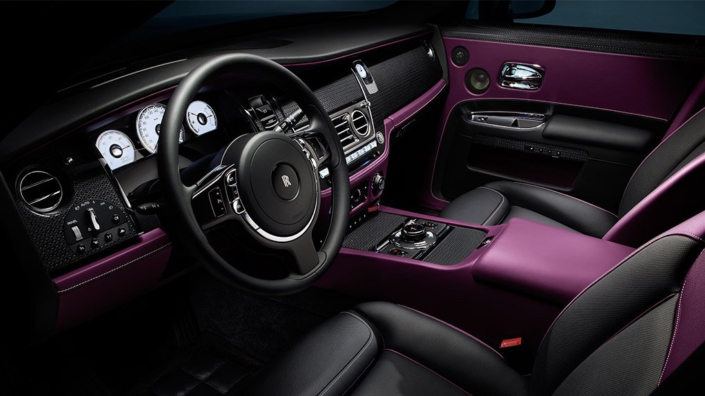 Inside the Rolls Royce Black Badge Ghost edition. The Black Badge cabin offers a darker interpretation of luxury. The centrepiece of the cabin is an aerospace-grade aluminium-threaded carbon fibre composite surfacing – material often seen on the surfaces of stealth aircraft. To create this material, threads of aircraft grade aluminium – 0.014 mm in diameter – are woven together before being bonded with carbon fibre.