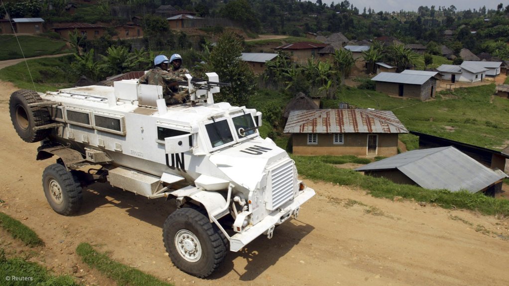 DETERRING HOSTILITIES The UN Mission in Congo patrols in a Casspir in the deserted town of Kanyabayonga (2004), days after the outbreak of hostilities between the rebel forces and army loyalists 