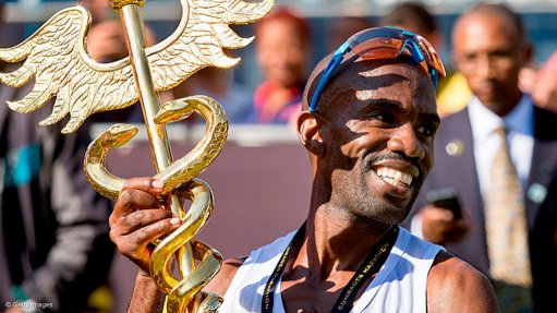 KZN: Premier Willies Mchunu congratulates winner of 2016 Comrades Marathon David Gatebe