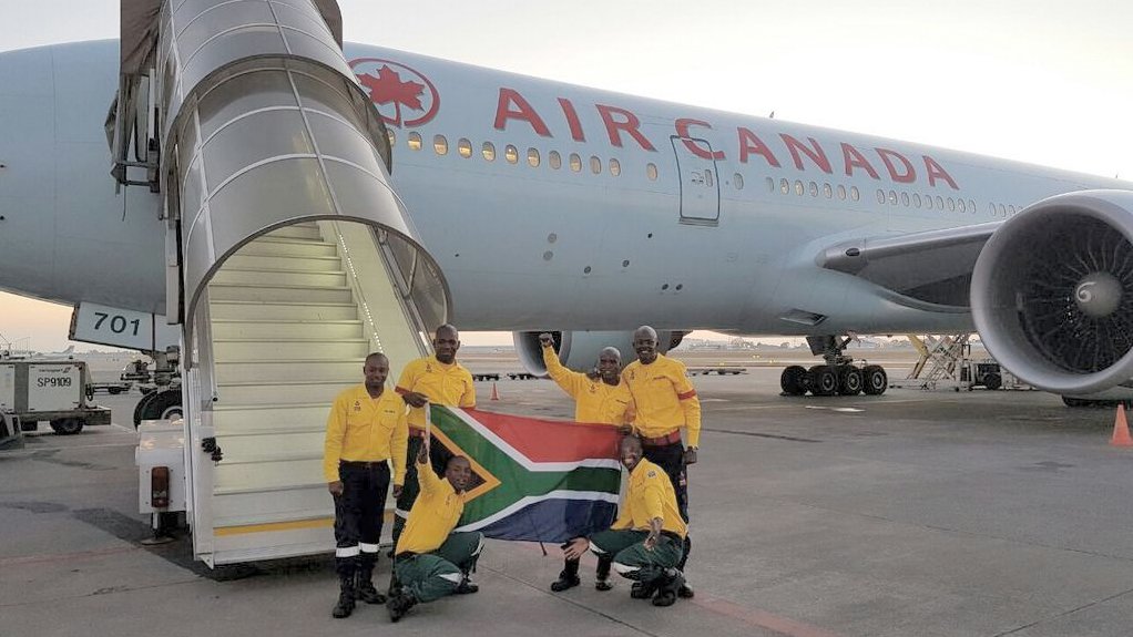 About 300 South African firefighters have arrived in Edmonton to assist combating the Alberta wildfires