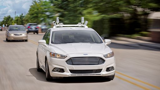 Ford to develop self-driving car for ride-hailing service