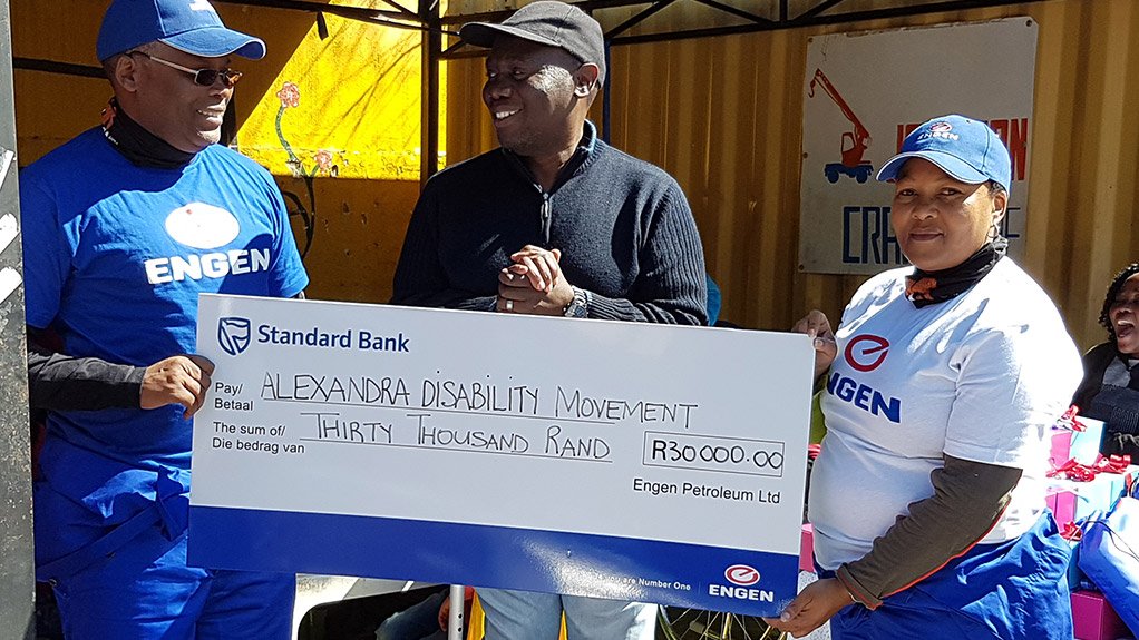 Engen employees green the Alexander Disability Movement