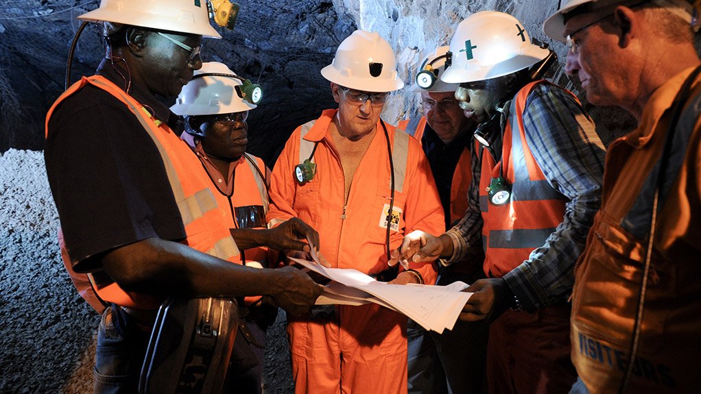 Randgold CEO Dr Mark Bristow (centre) with host country management at the Loulo gold mine