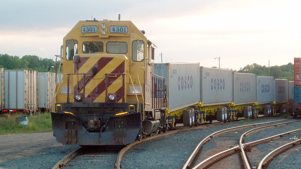 The RailRunner units carry standard shipping containers