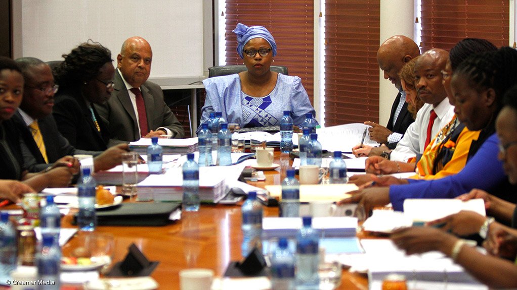 SAA chairperson Dudu Myeni (centre) flanked by Finance Minister Pravin (left) and Deputy Finance Minister Mcebisi Jonas (right)