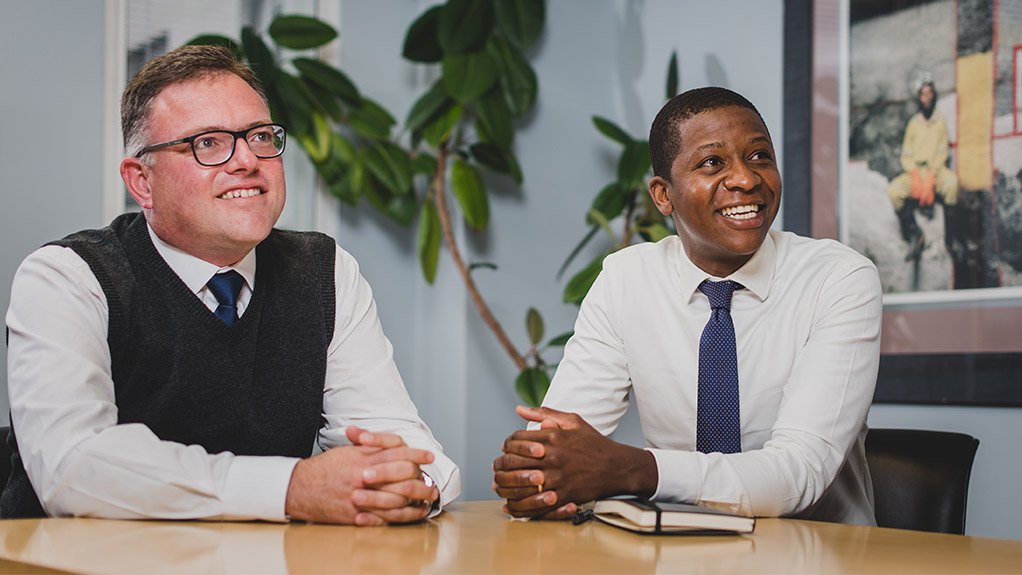 Thakadu CEO Ruli Diseko (right) with Lonmin CFO Barrie van der Merwe.