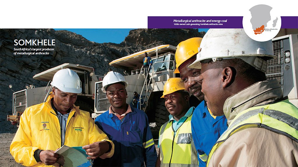 Workers in discussion at Somkhele anthracite mine, KwaZulu-Natal
