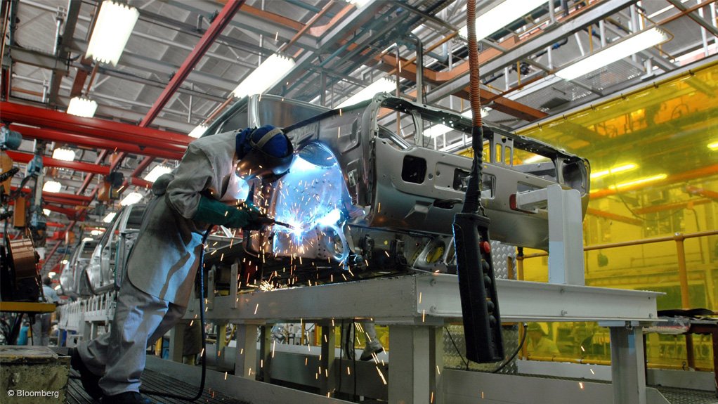 Manufacturing activity rises, but momentum weak