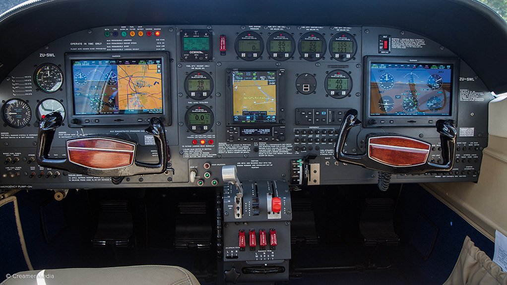 DIGITAL The modern ‘glass cockpit’ of a Falcon 402 (with some analogue backup instruments on the far left)